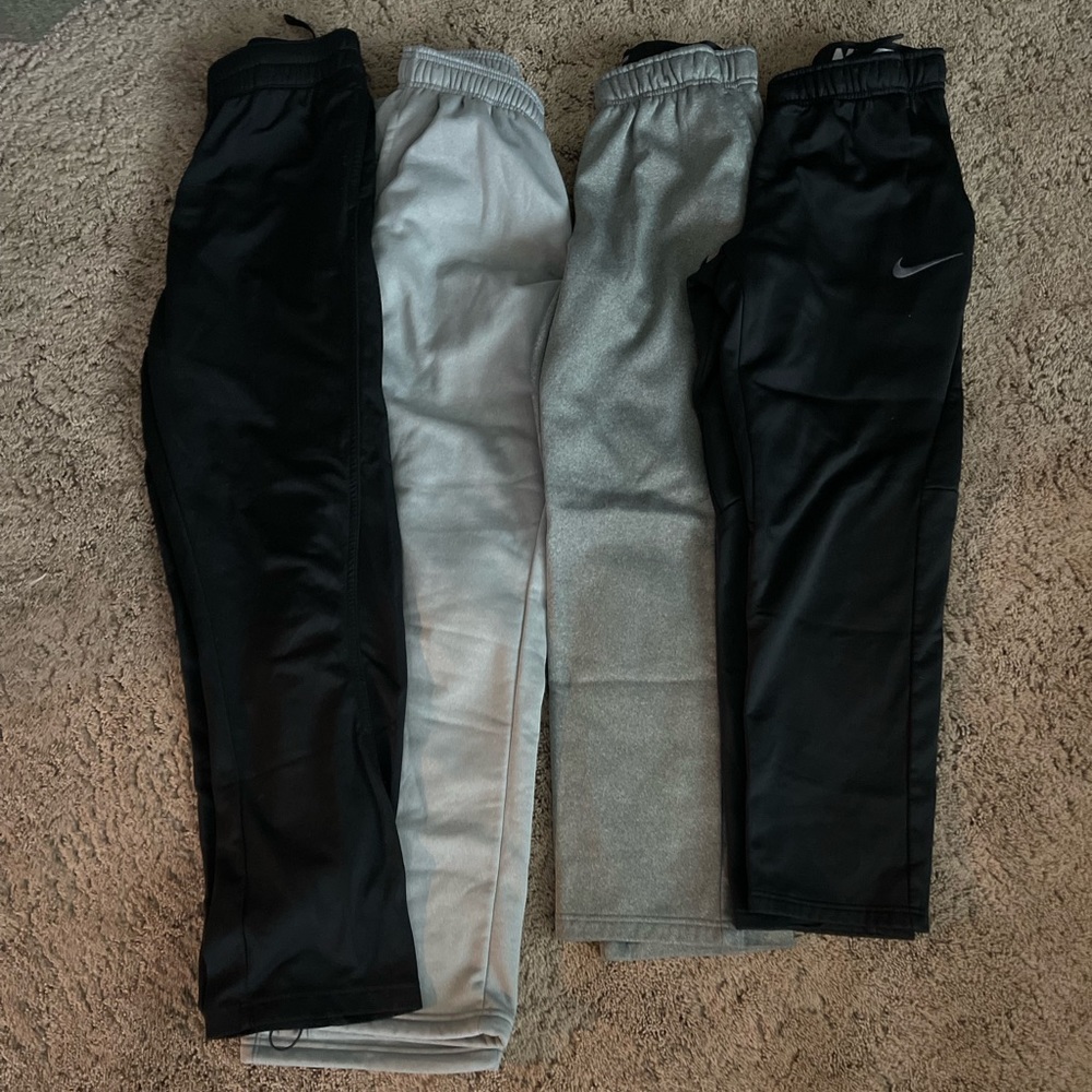 Nike and Under Armour Men’s small & medium pants.